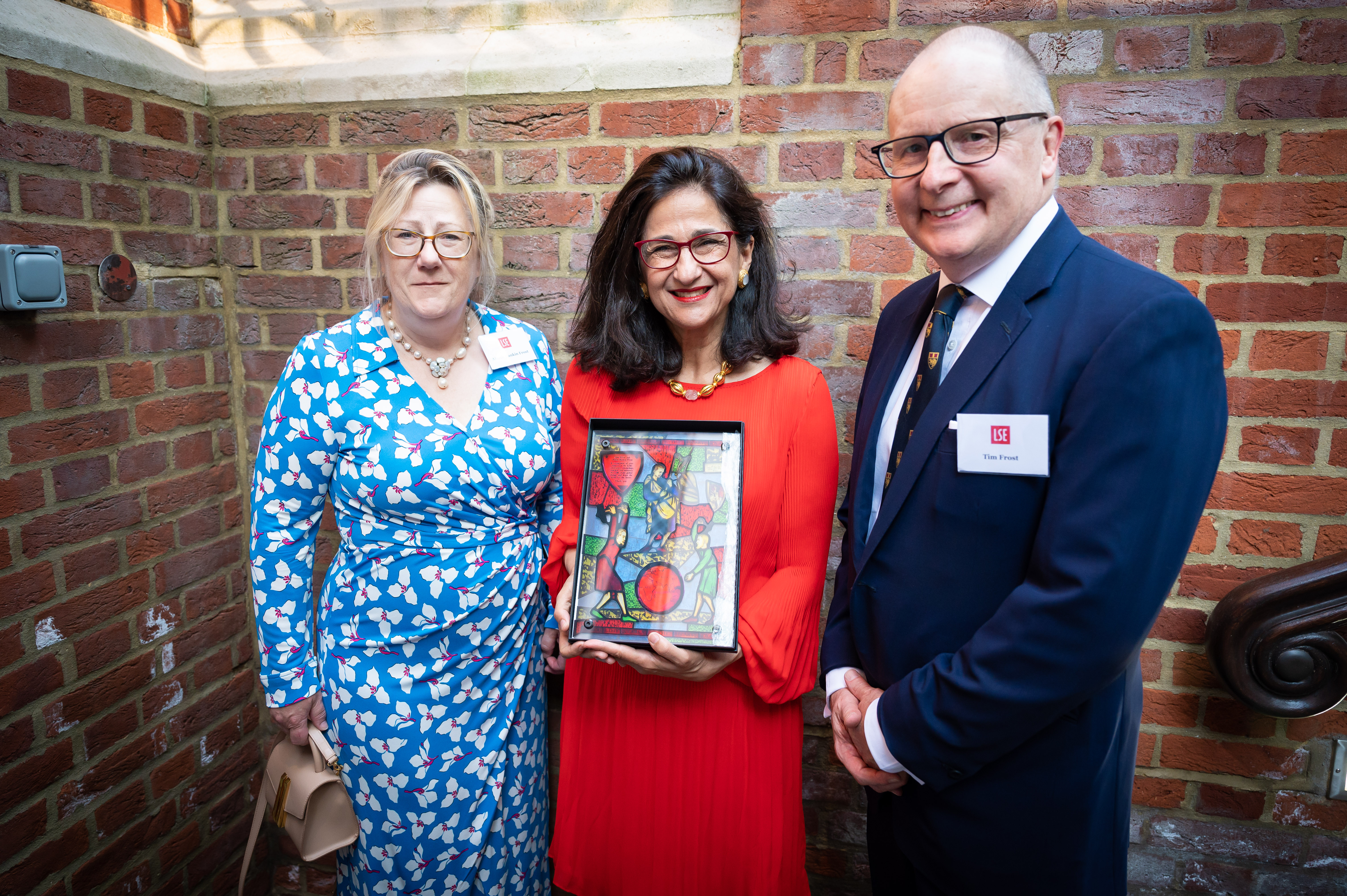 Alison Rankin Frost and Tim Rankin Frost with Minouche Shafik holding Fabian Window
