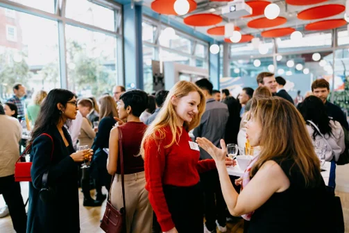 alumni mingling in the alumni centre