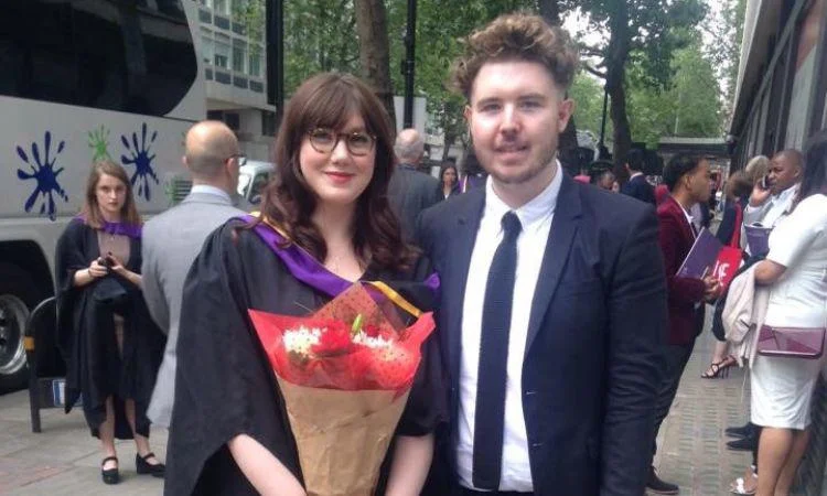 Alumni Selbi Sasioglu and Jake Fryer at graduation
