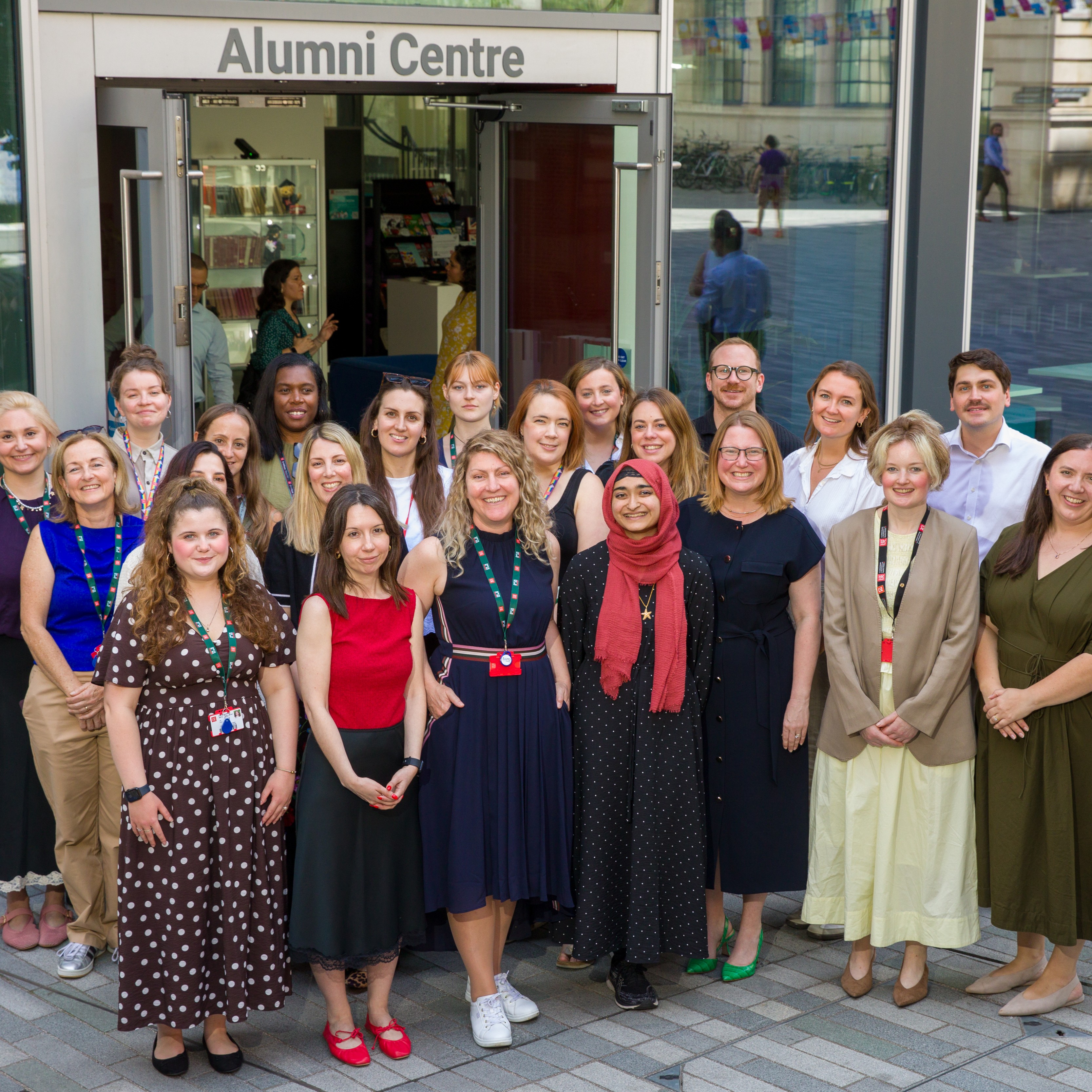 A group of LSE alumni engagement colleagues gathered outside the alumni centre on LSE campus.