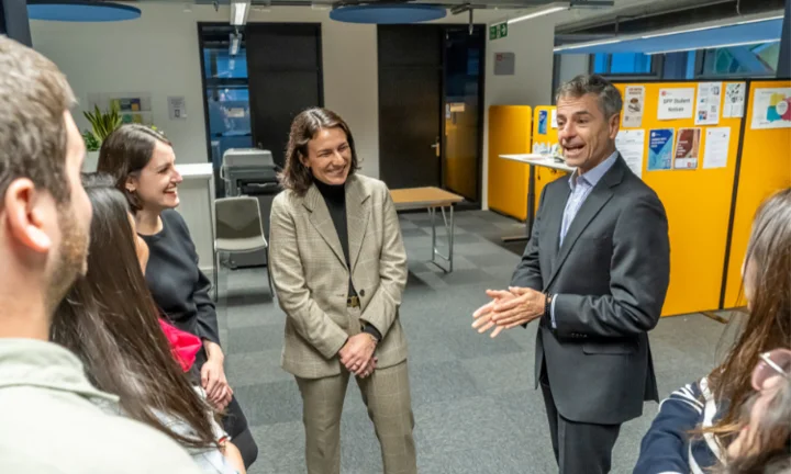 Professor Velasco and Isabella Luksic talking to Luksic scholars