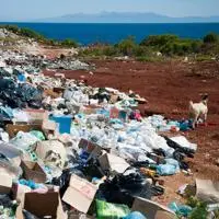 Mountain of rubbish on the beach by the sea