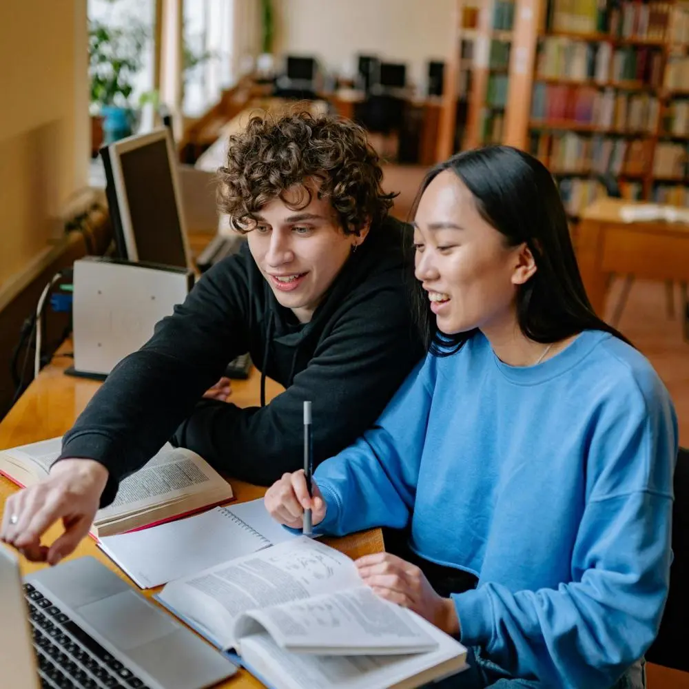 students with laptop
