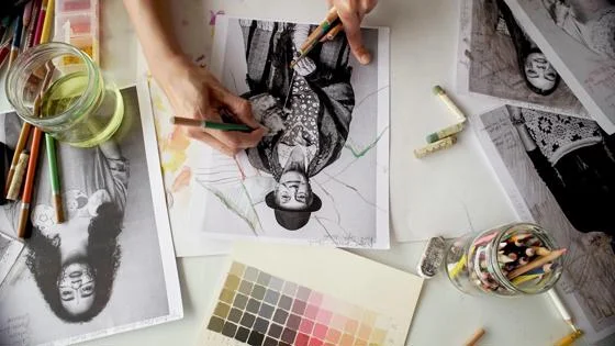 An artist conducts a preparatory sketch
