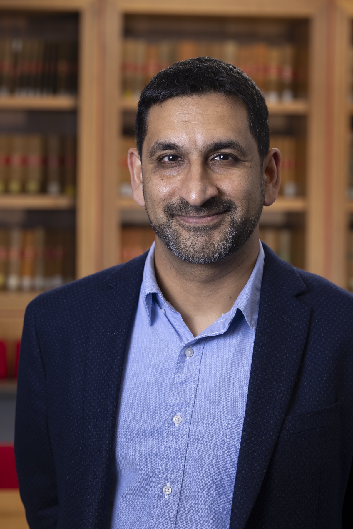 Man smiling in suit