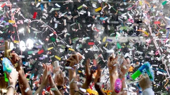 An audience with streamers and ticker tape