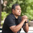Eduardo Bonilla Silvas sat with his hands clasped