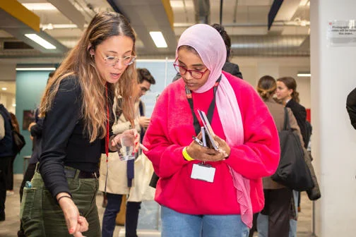 Careers Fair October 2022. Students meeting an employer.
