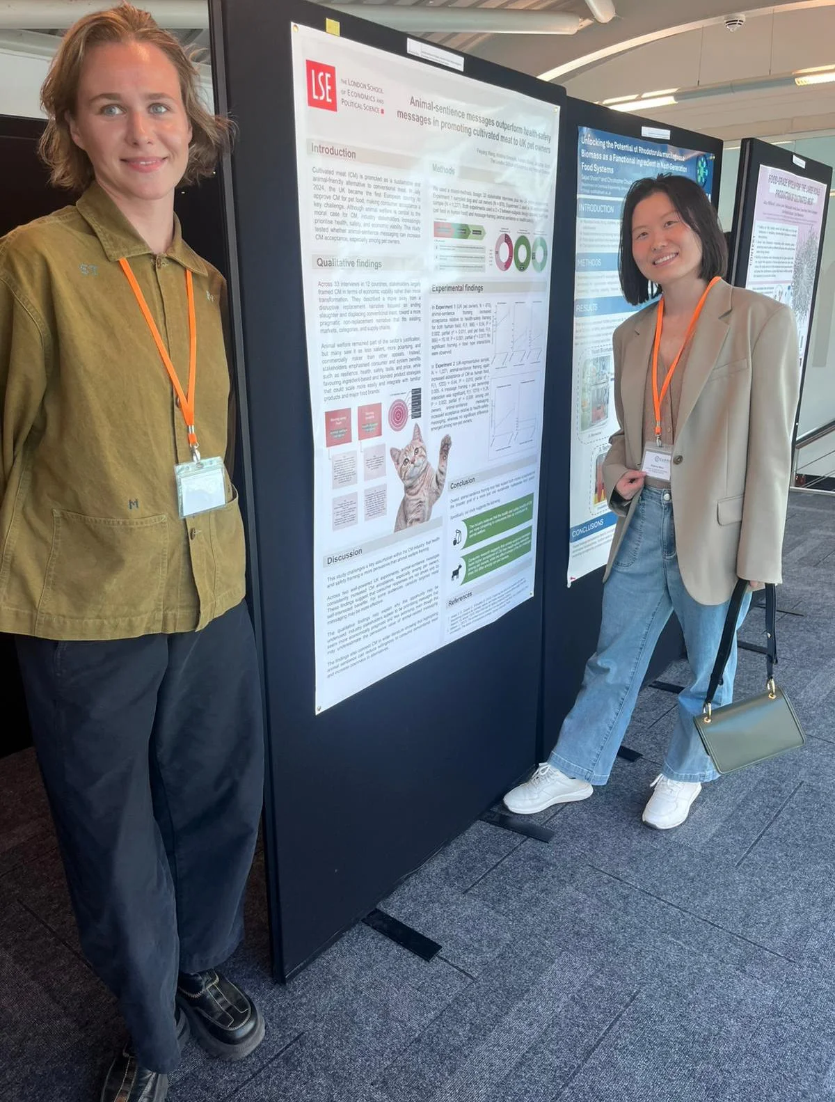 Kristina Kiminiute and Dr Feiyang Wang presenting their research poster.