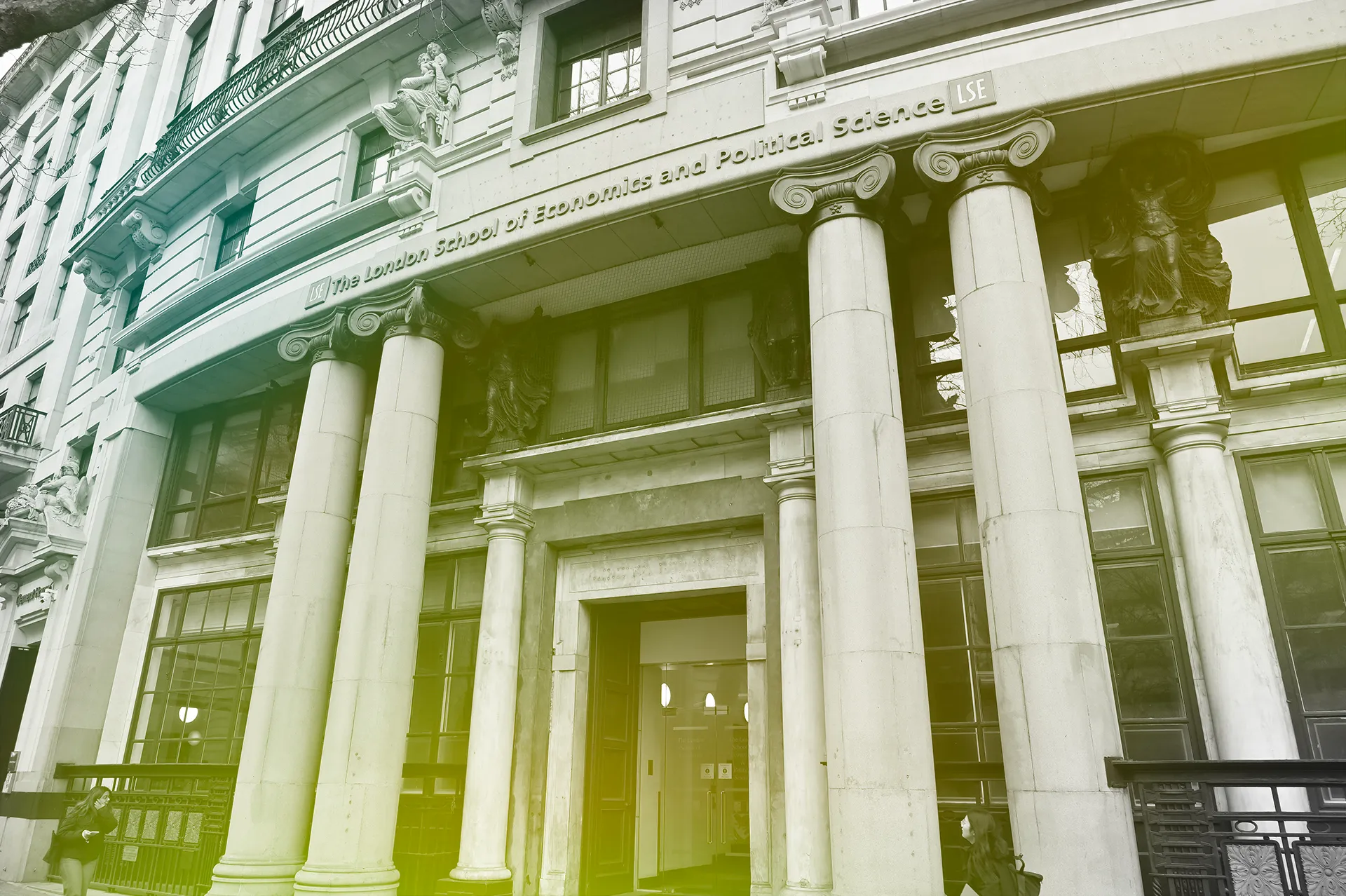 Entrance of the London School of Economics and Political Science (LSE) building with classical columns and façade.
