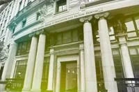 Entrance of the London School of Economics and Political Science (LSE) building with classical columns and façade.
