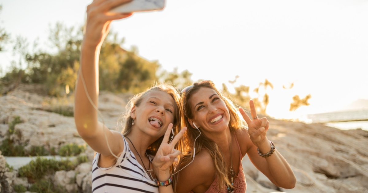 Young girls take a selfie

