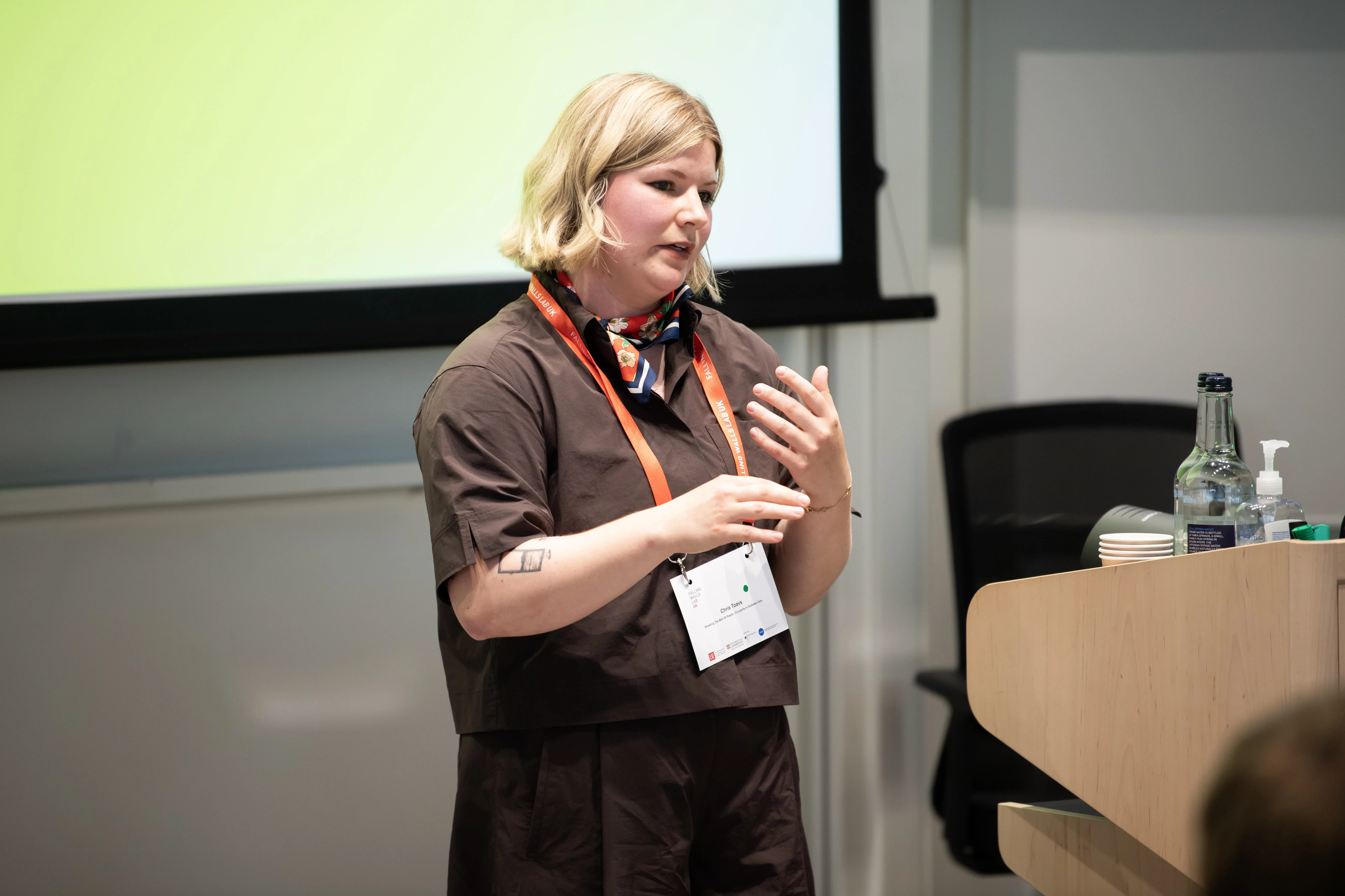 Christine Toavs presenting her pitch at the Falling Walls Lab UK.