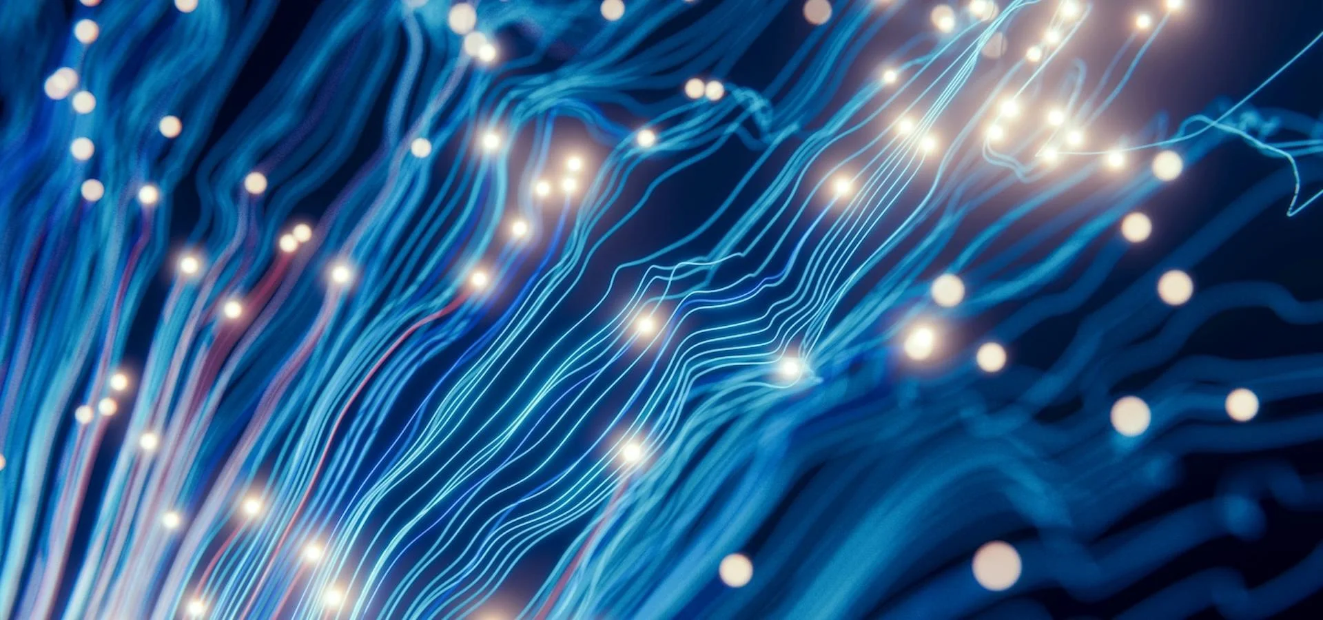 Blue energy beams traveling upwards with light spheres at the end of them