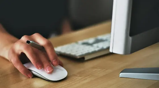 Hand clicking a mouse