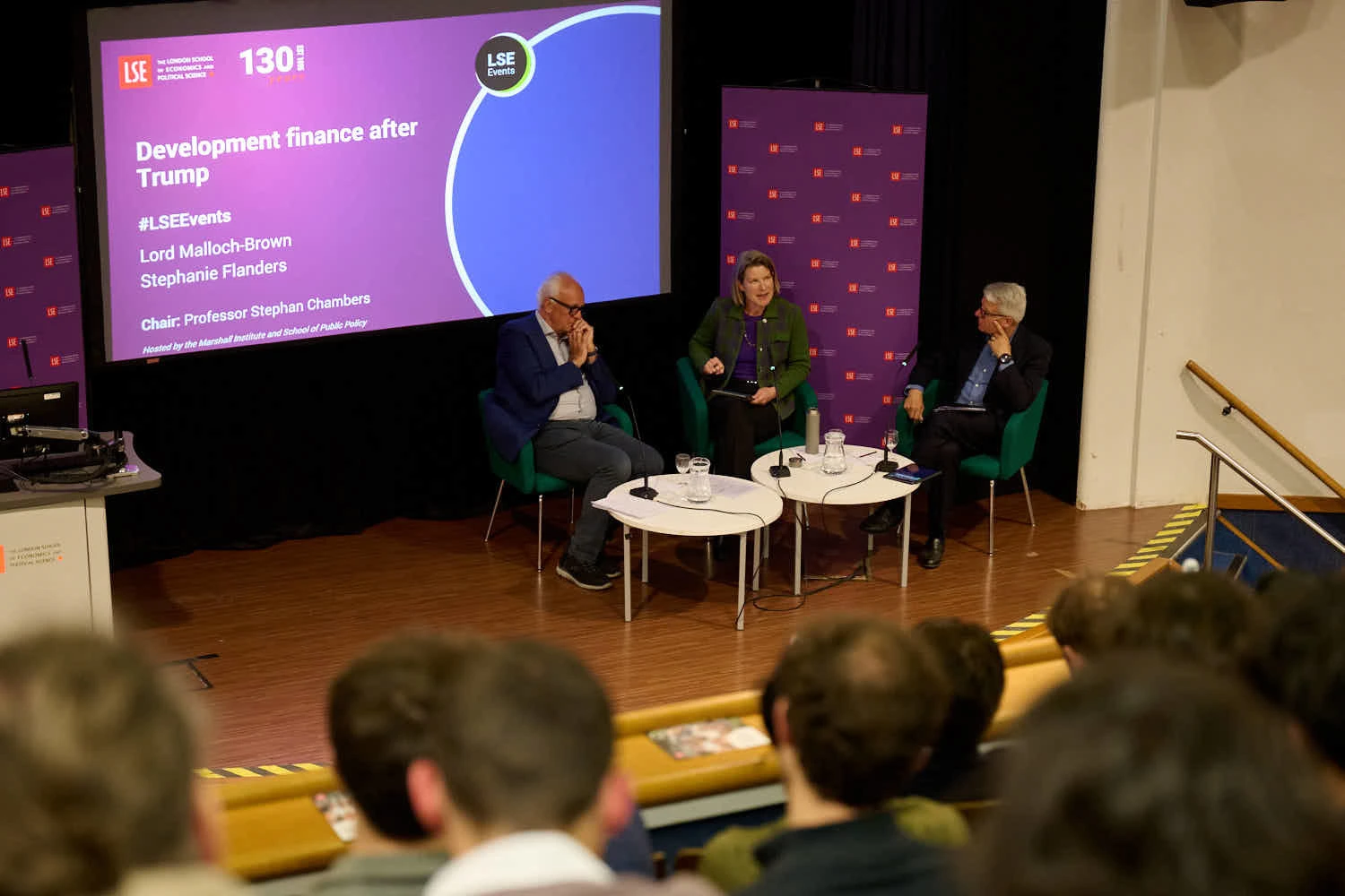 Three speakers on stage