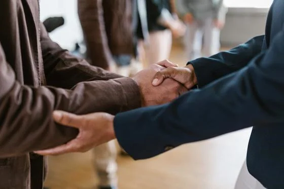 Close-up of two businesspeople shaking hands