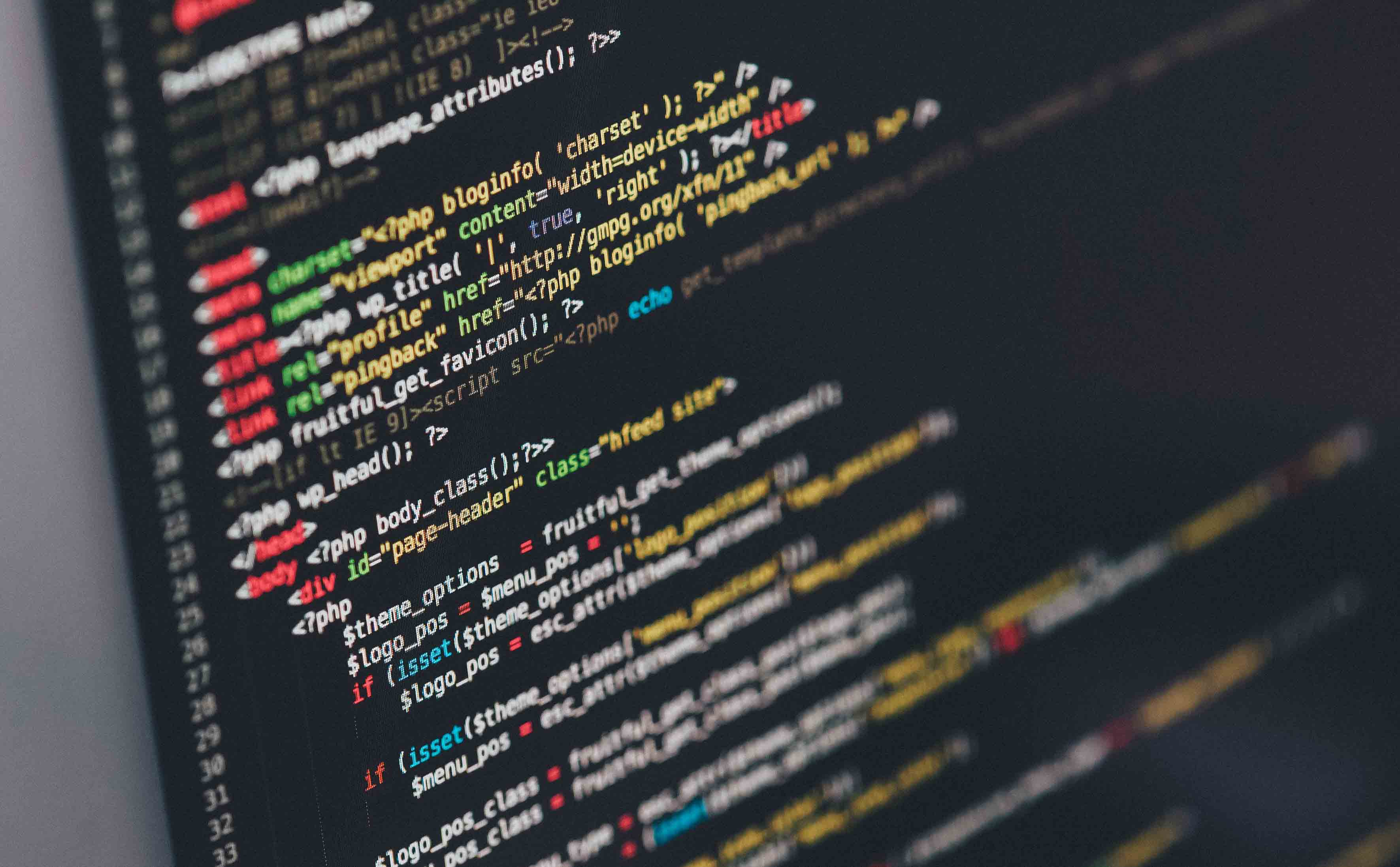Decorative image: code on computer screen