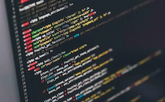 Decorative image: code on computer screen