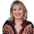 headshot of Colleen Theron
