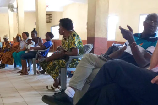 Audience siting and discussing