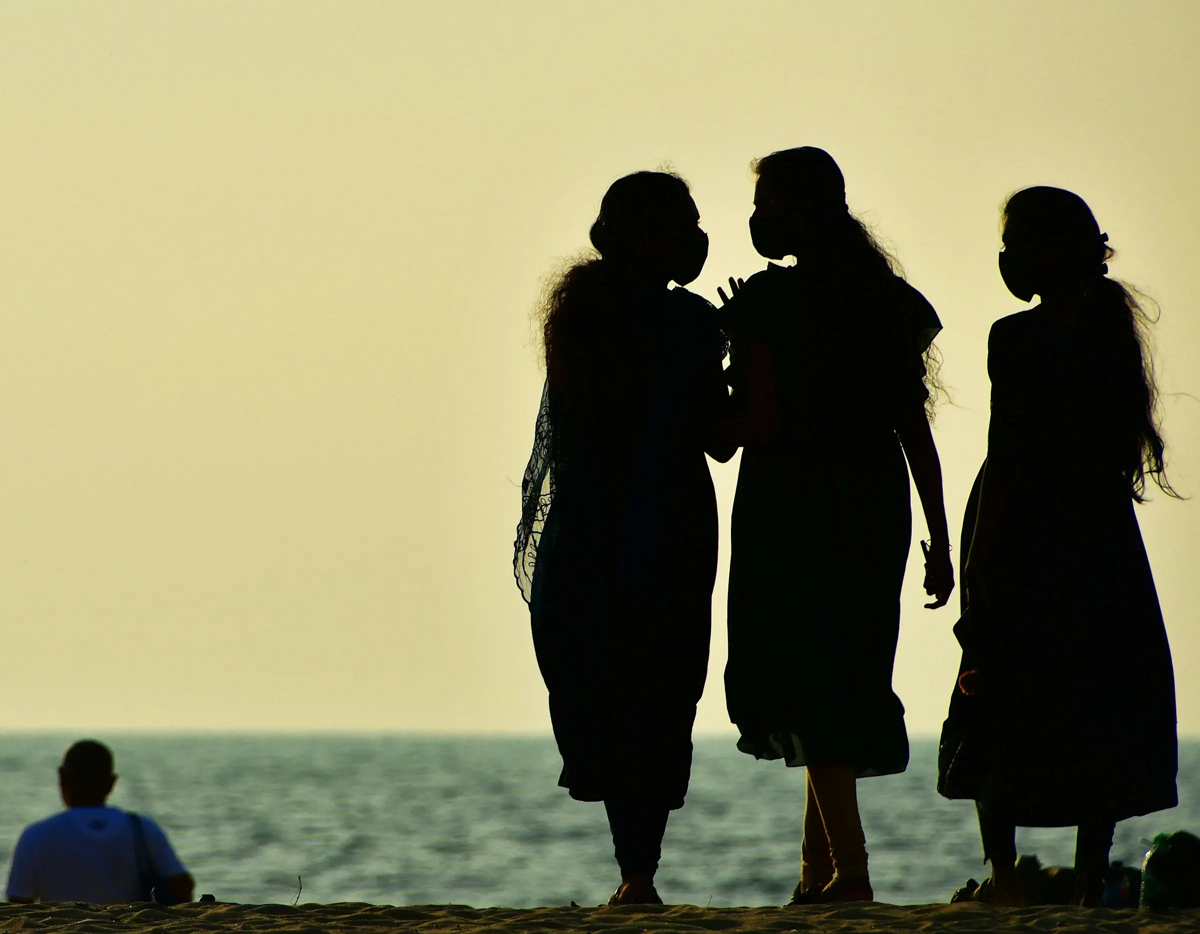 Three women on a beach