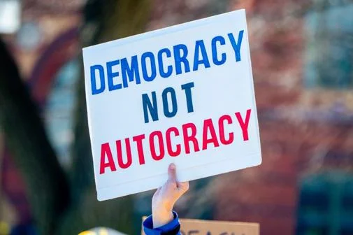 Democracy not autocracy