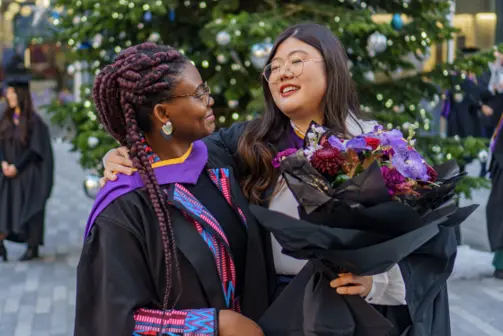 Two students at graduation