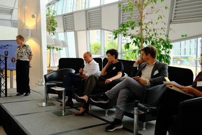 Members of a panel in discussion