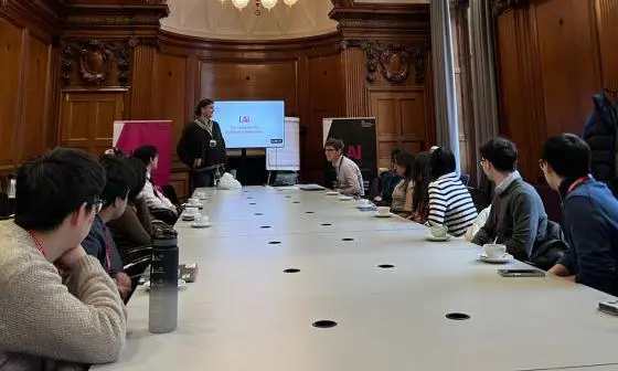 group of students look at presentation in Cabinet Office