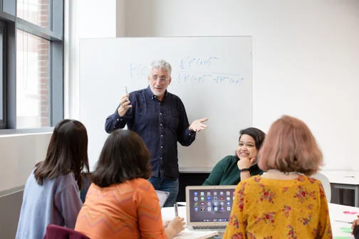 Teacher teaching students in LSE Life