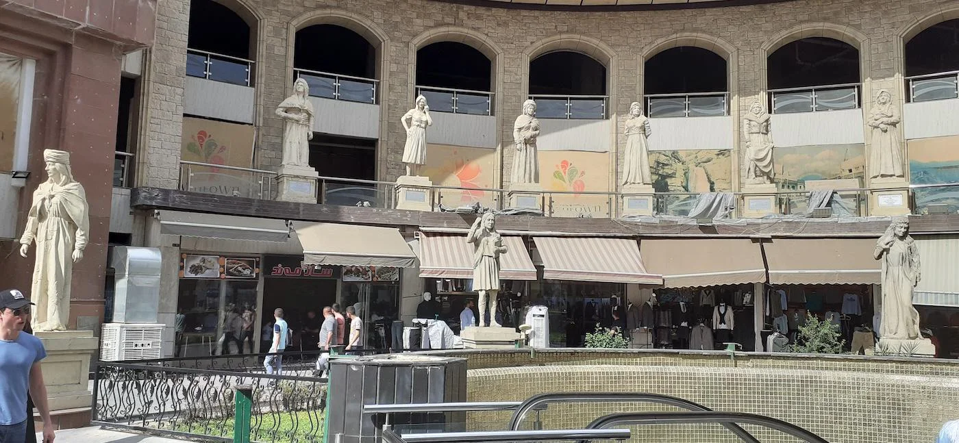 Statues of Kurdish historical female figures outside a market in Hawler.