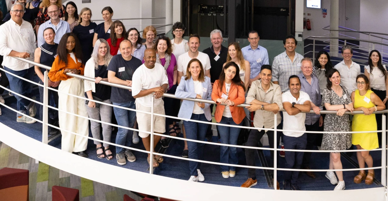 EMSc alumni on LSE library stairs