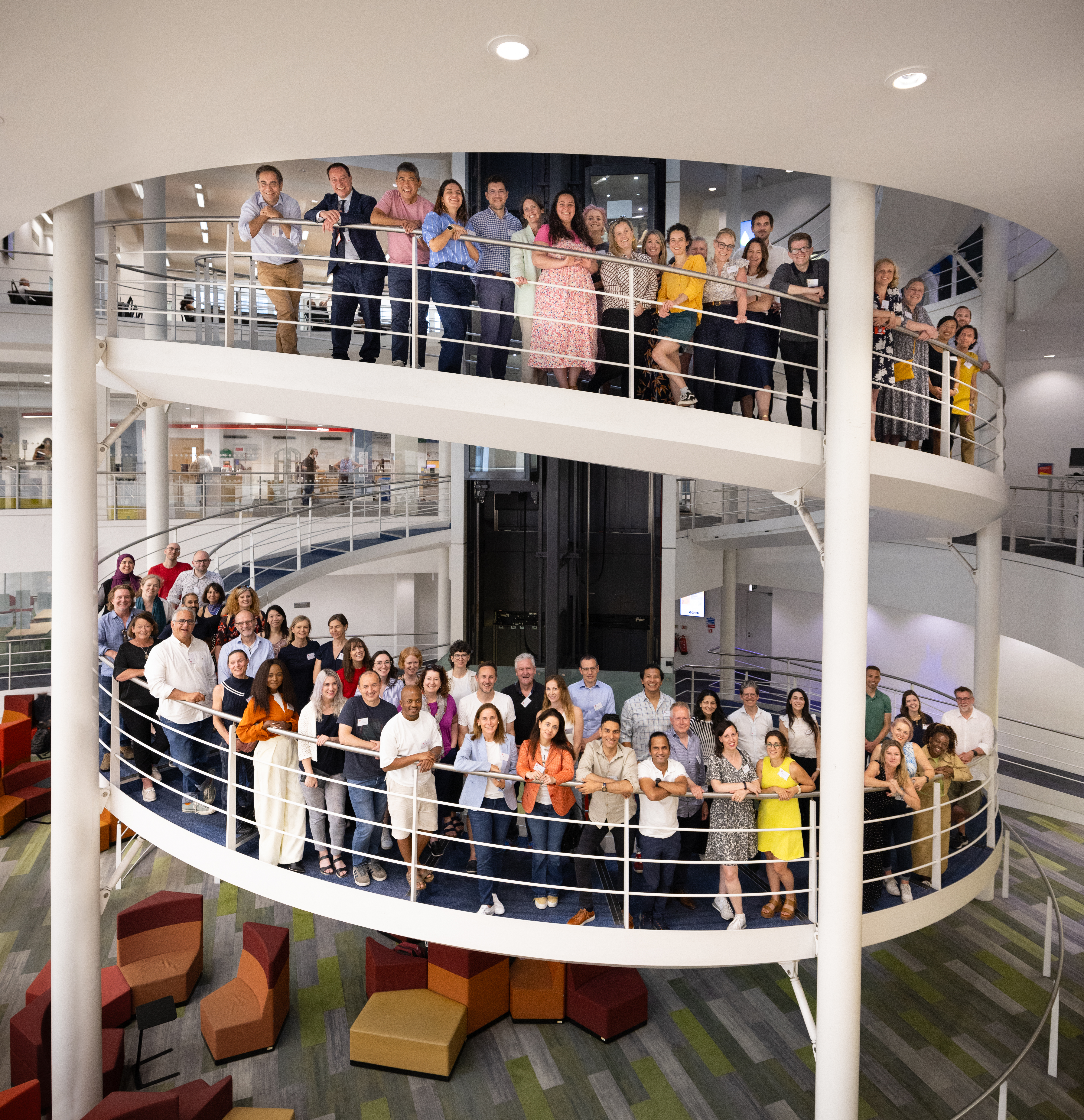 EMSc alumni on LSE library stairs in 2024