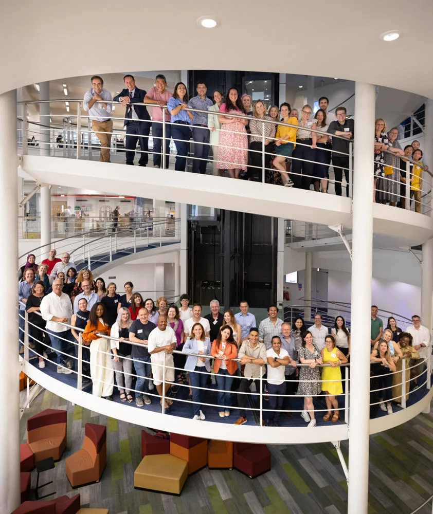 EMSc alumni on LSE library stairs in 2024