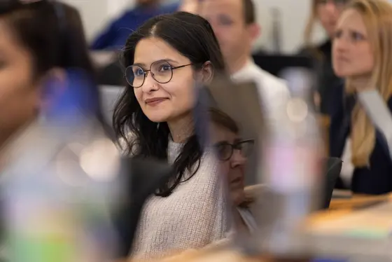 Audience watching a public lecture.