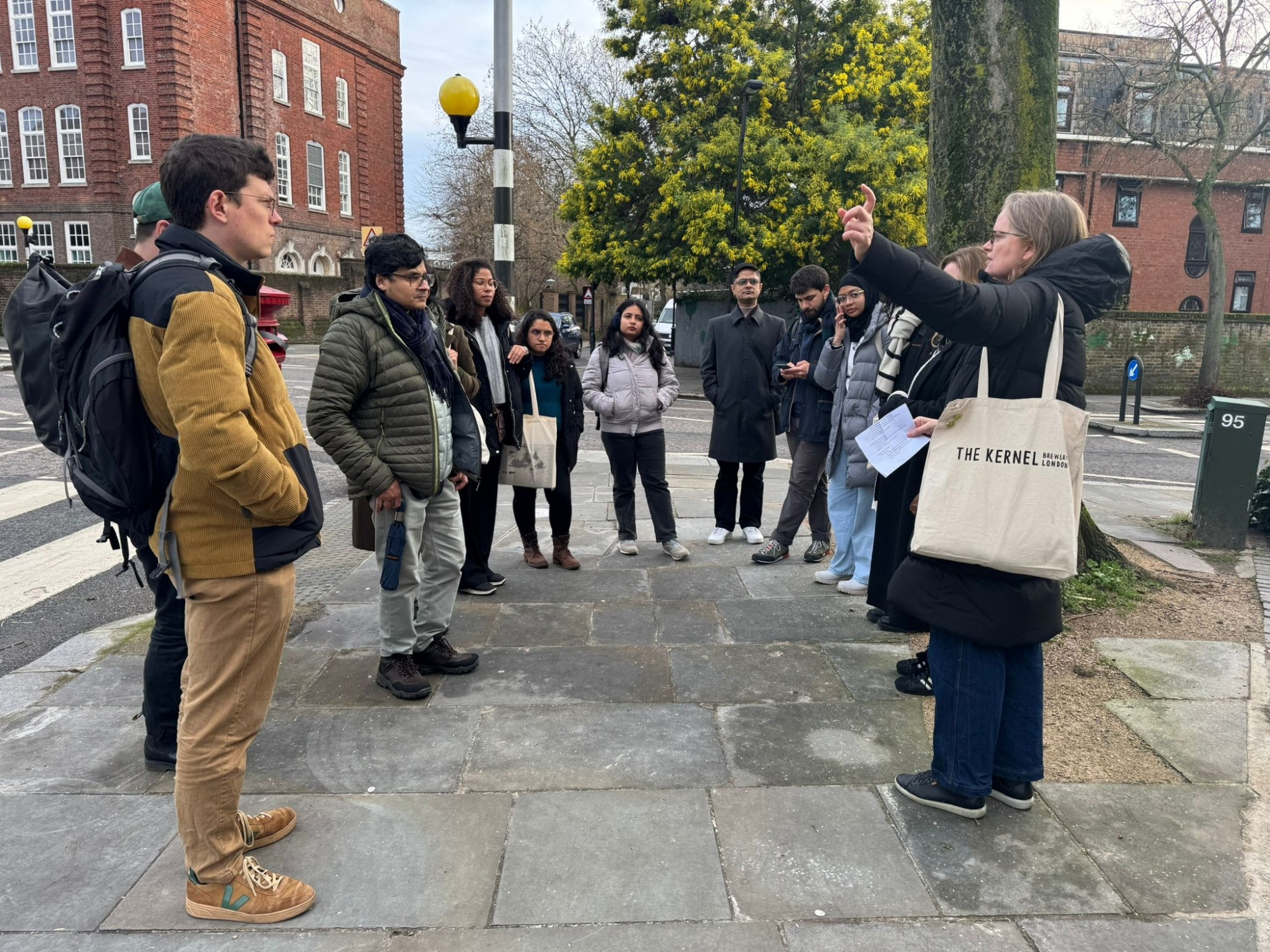 
‪Flora Cornish‬
 ‪@floracornish.bsky.social‬
· 1d
We started on Lancaster Road, and discussed the inequalities and contestation over public assets and land in the Royal Borough of Kensington and Chelsea

A walking tour leader in a green hat speaks to a g