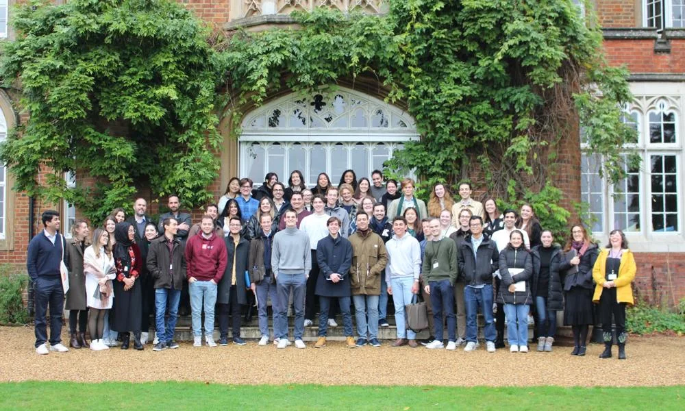 Group of students standing outside Cumberland Lodge