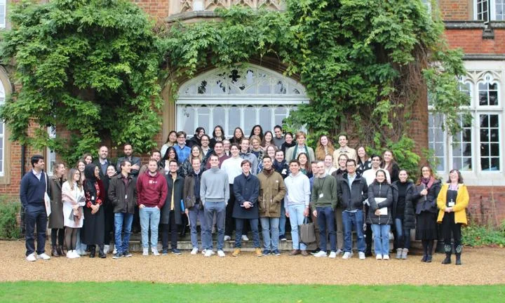 Group of students standing outside Cumberland Lodge