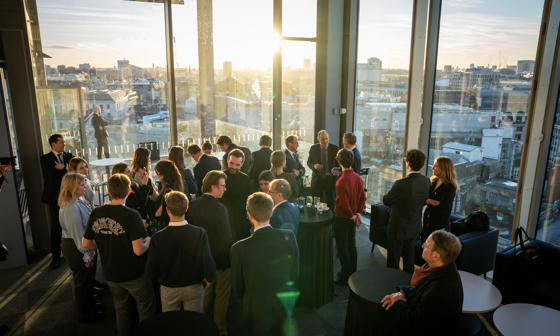 Students networking on 11th floor