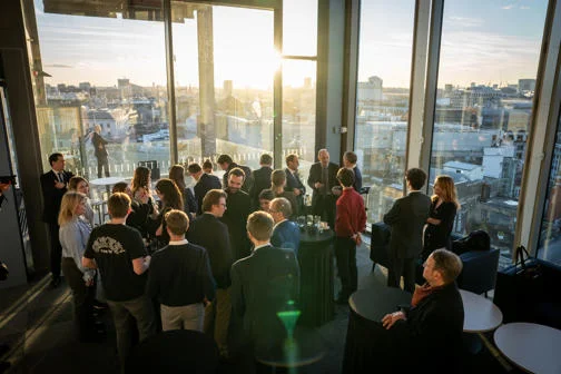 Students networking on 11th floor