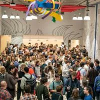 Large group of people socialising