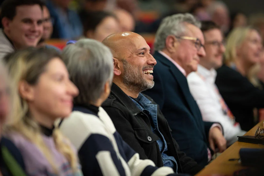 The audience smiling at an LSE public event