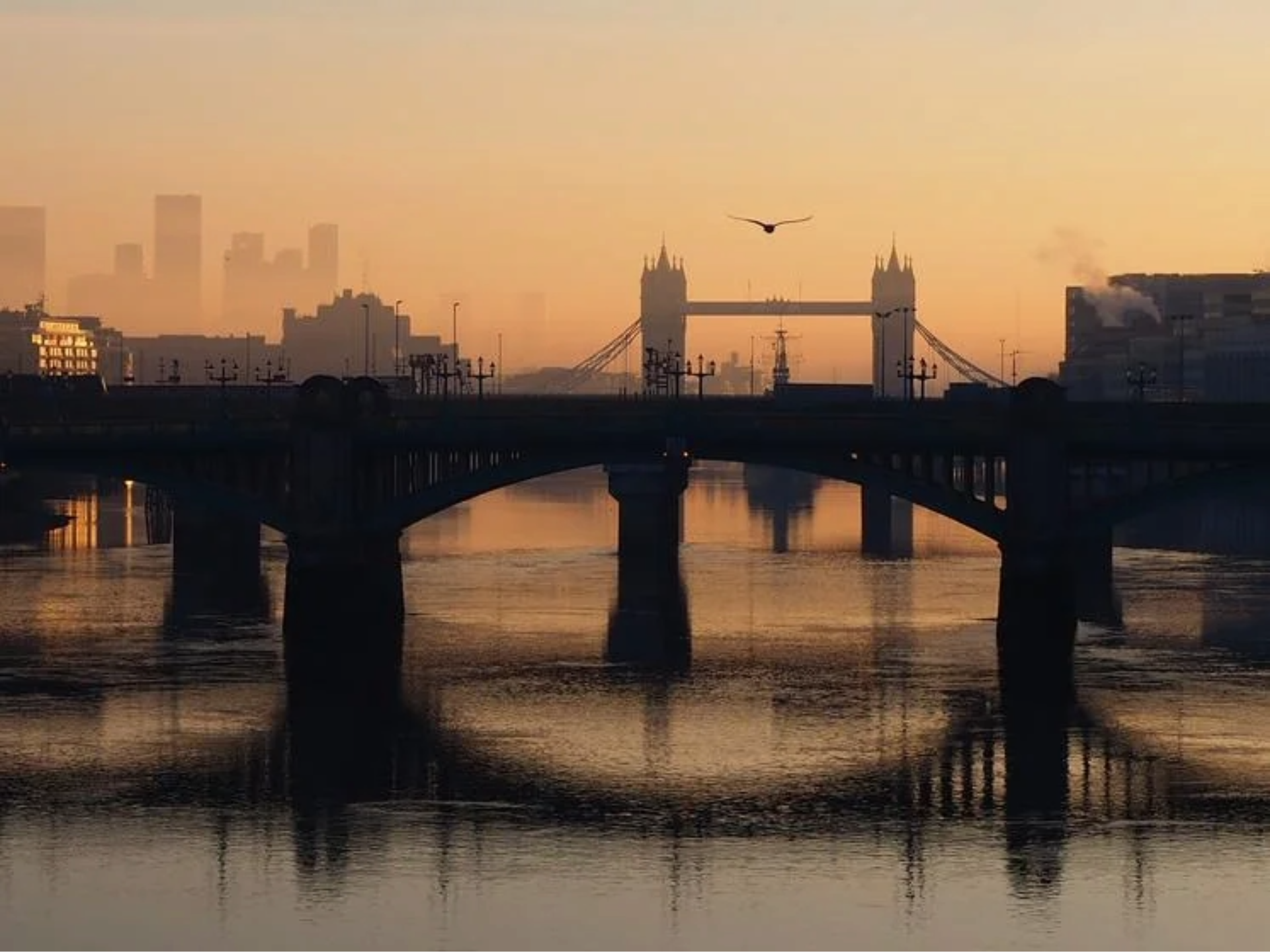 london bridge and tower bridge at sunset