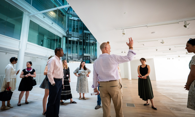 Julian Robinson and Global Alumni Board on the ground floor of 61 Aldwych