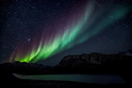 The Northern Lights over mountains