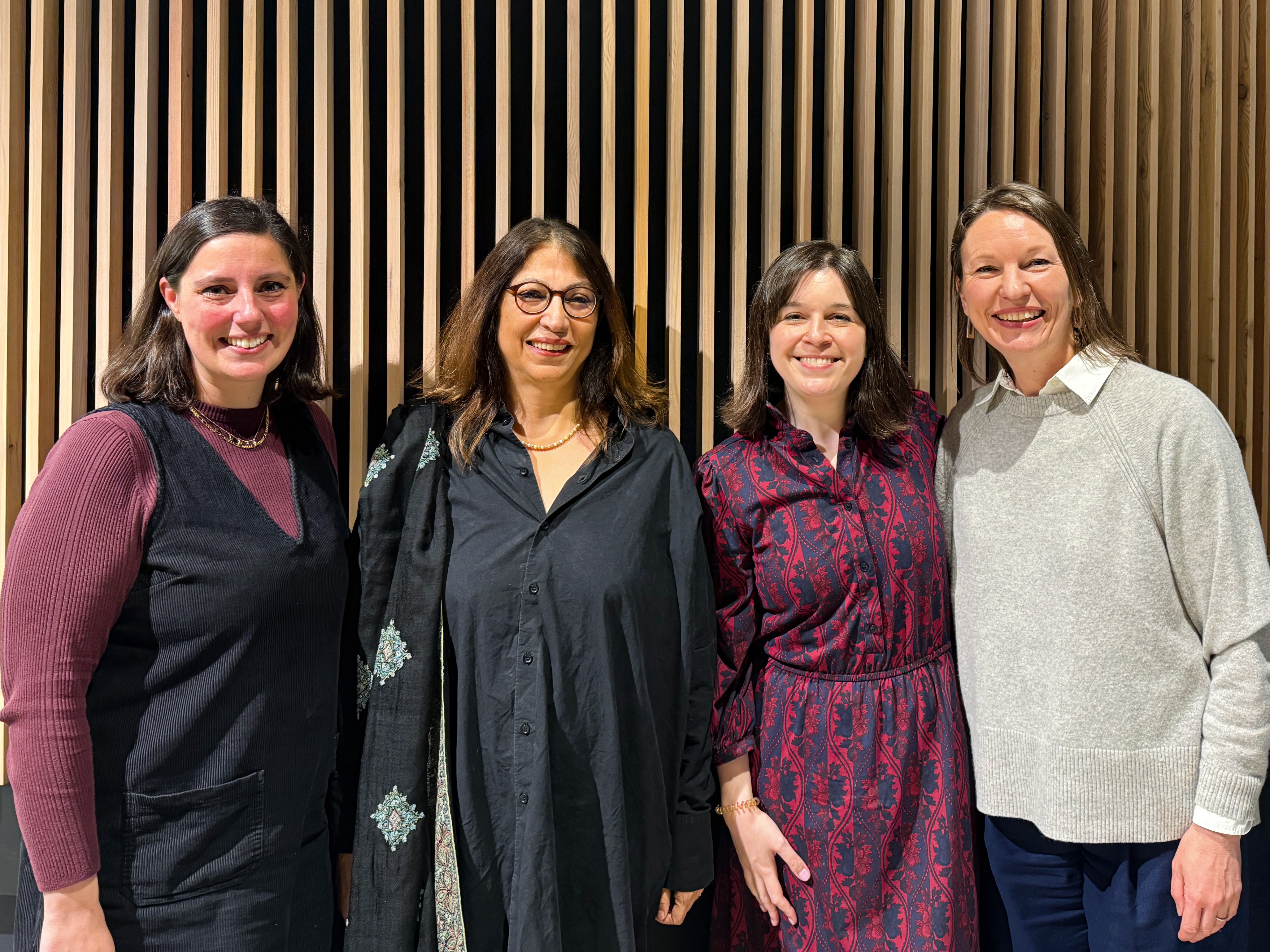 Laura Antona, Shirin Rai, Sarah Marie Hall and Claire Mercer smiling to camera.