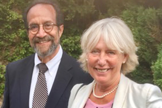 Rita and Jeffrey Golden stand in a garden