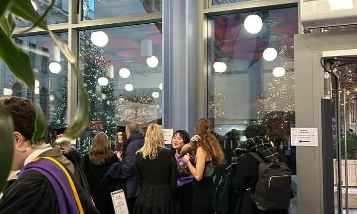 Graduates in alumni centre