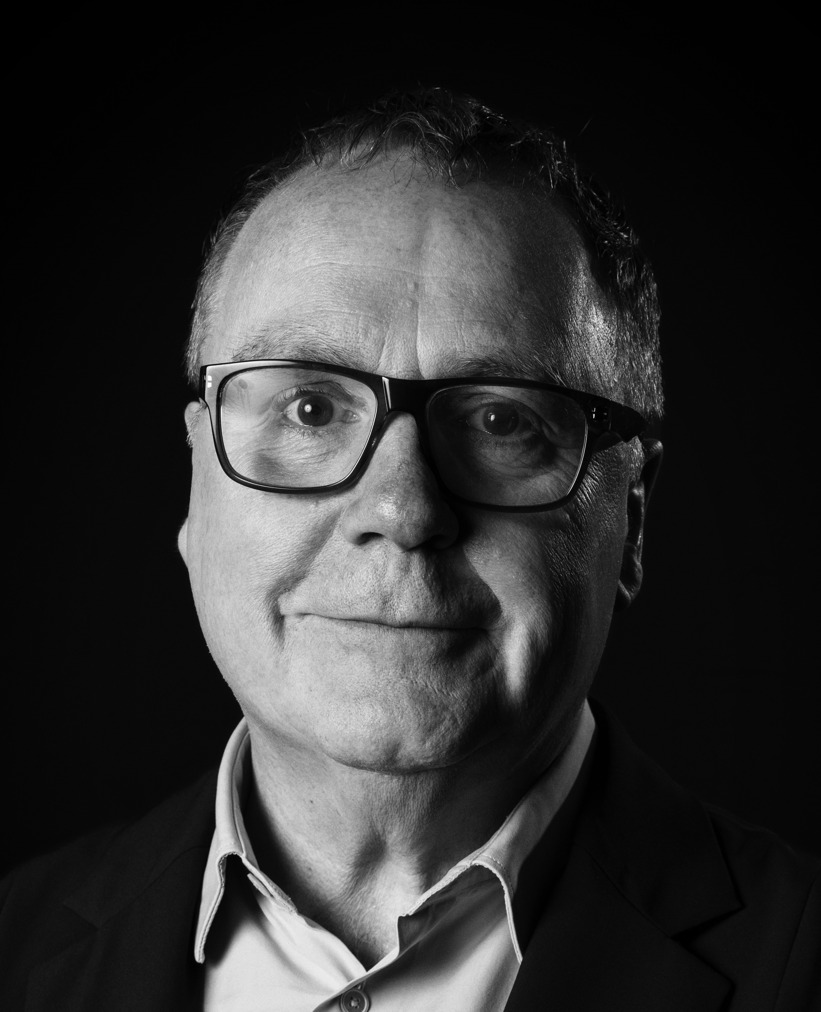 Greg clark black and white headshot
